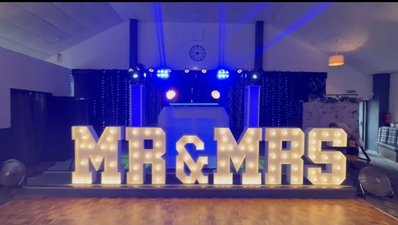 Professional DJ lighting and sound setup at an event in the West Midlands